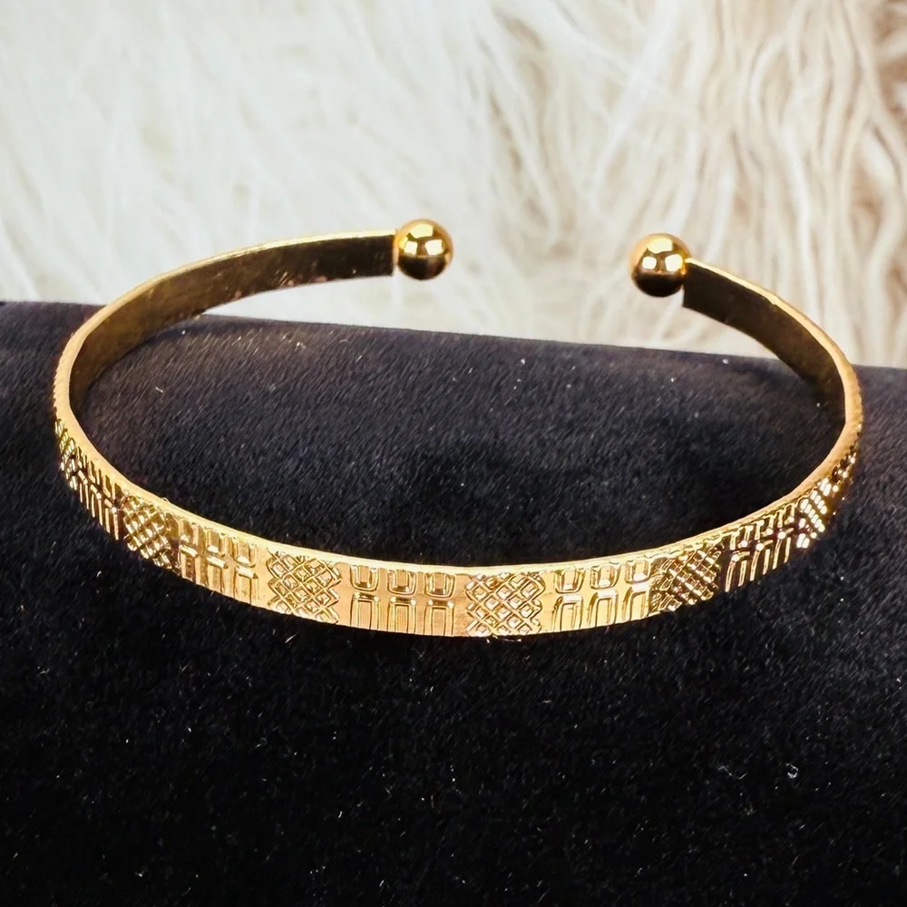 Elegant Goldtone Textured Bangle Bracelet